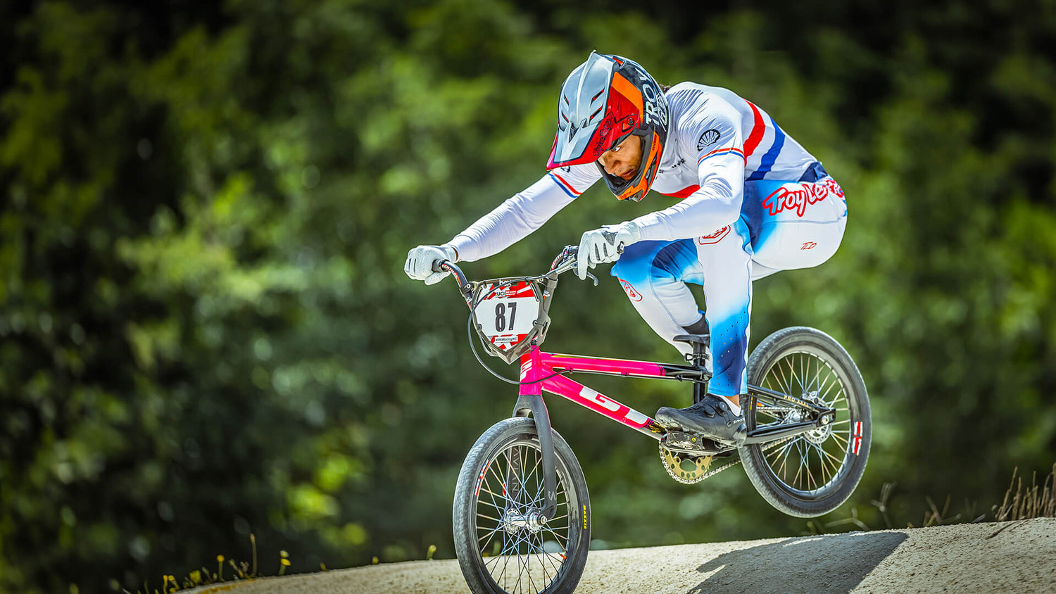 BMX rider going over a jump in their Sprint Ultra gear