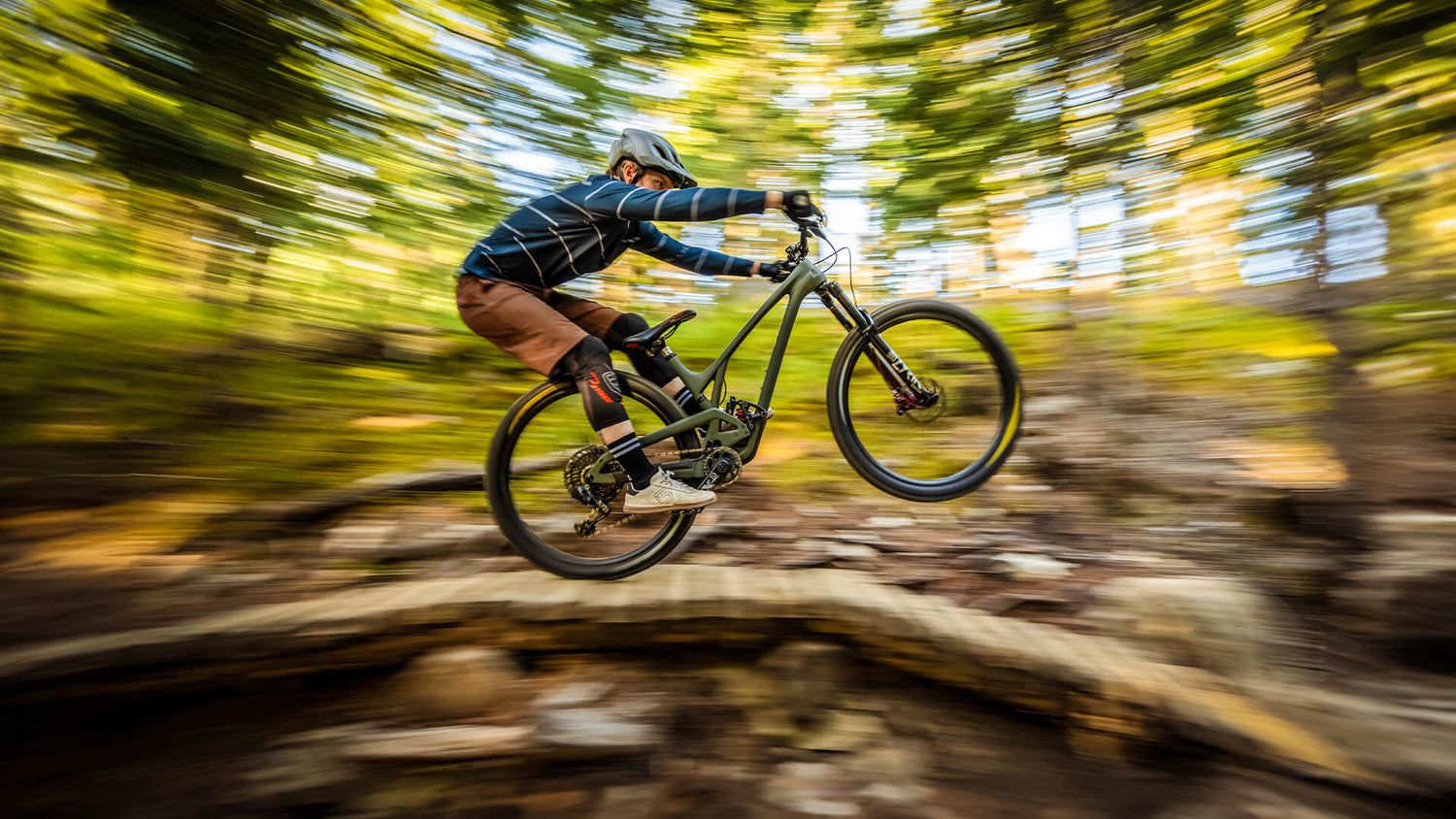 Mountain bike rider on a trail in the mountains