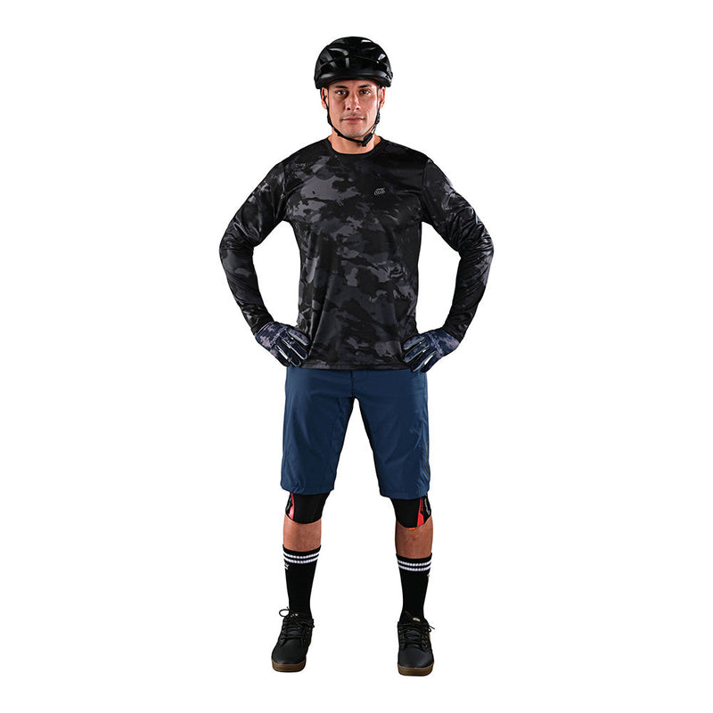 Ligne courte Flowline avec doublure bleu uni